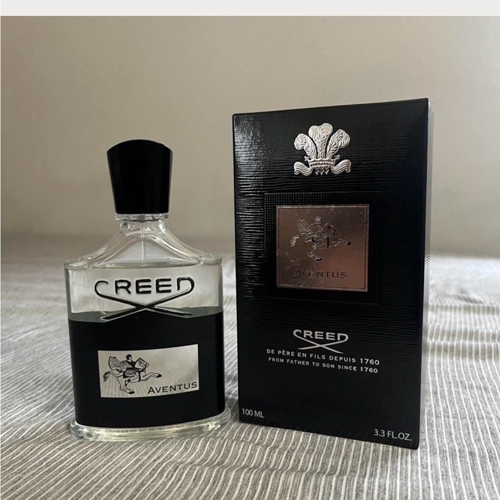 Creed Aventus Fragrance with Black and Silver Accents